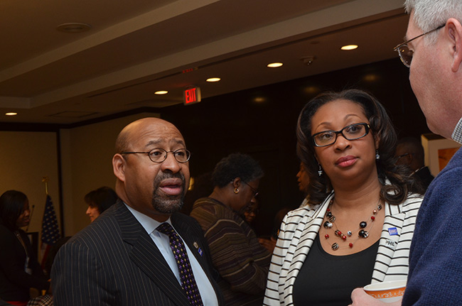 Photo of Mayor Michael Nutter and Desiree Peterkin Bell at the DNC 2015 Winter Meeting.