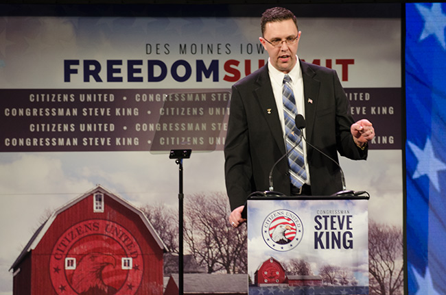photo of Republican Party of Iowa Co-Chair Cody Hoefert speaking at the Iowa Freedom Summit