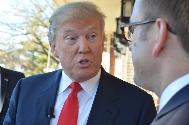 photo 1 of donald trump doing an interview before the iowa freedom summit