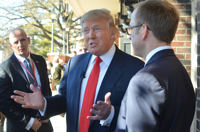photo 2 of donald trump doing an interview before the iowa freedom summit